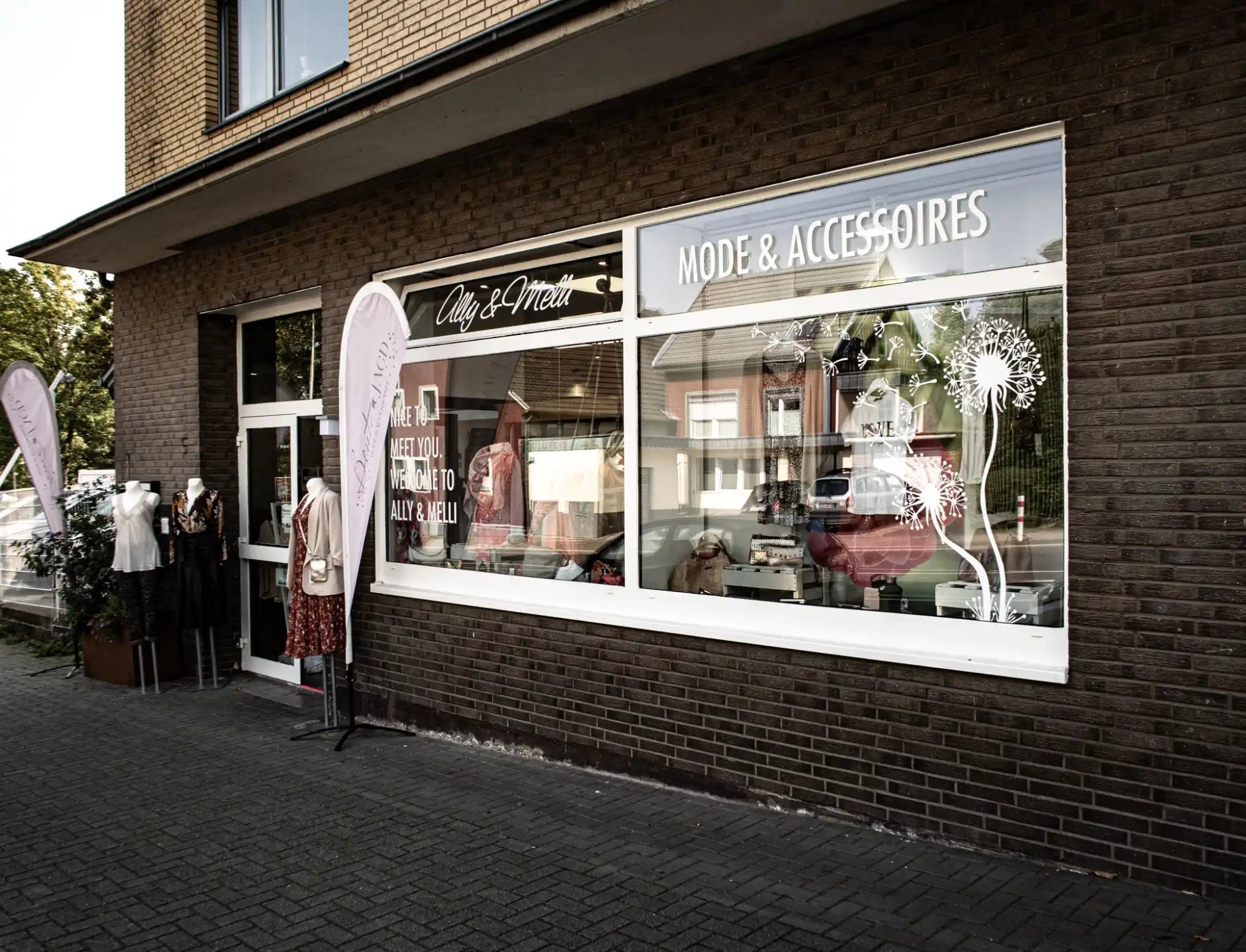 Brick building with storefront.